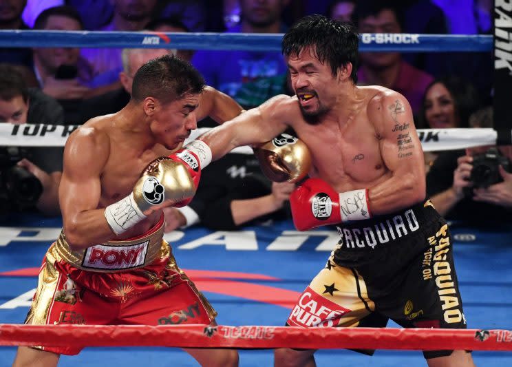 Manny Pacquiao (R) lands a right during his title-winning effort over Jessie Vargas on Nov. 5. (Getty Images)