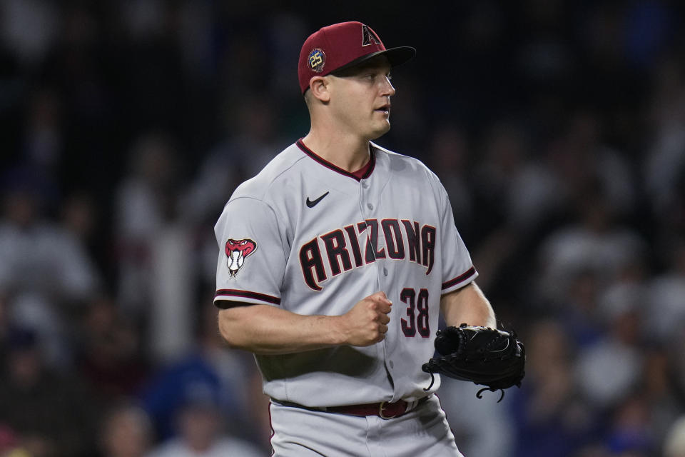 Arizona Diamondbacks relief pitcher Paul Sewald celebrates the team's 6-2 over the Chicago Cubs in a baseball game Thursday, Sept. 7, 2023, in Chicago. (AP Photo/Erin Hooley)