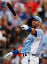 American League All-Star Jose Bautista #19 of the Toronto Blue Jays reacts as he is at bat in the first round during the State Farm Home Run Derby at Kauffman Stadium on July 9, 2012 in Kansas City, Missouri. (Photo by Jamie Squire/Getty Images)