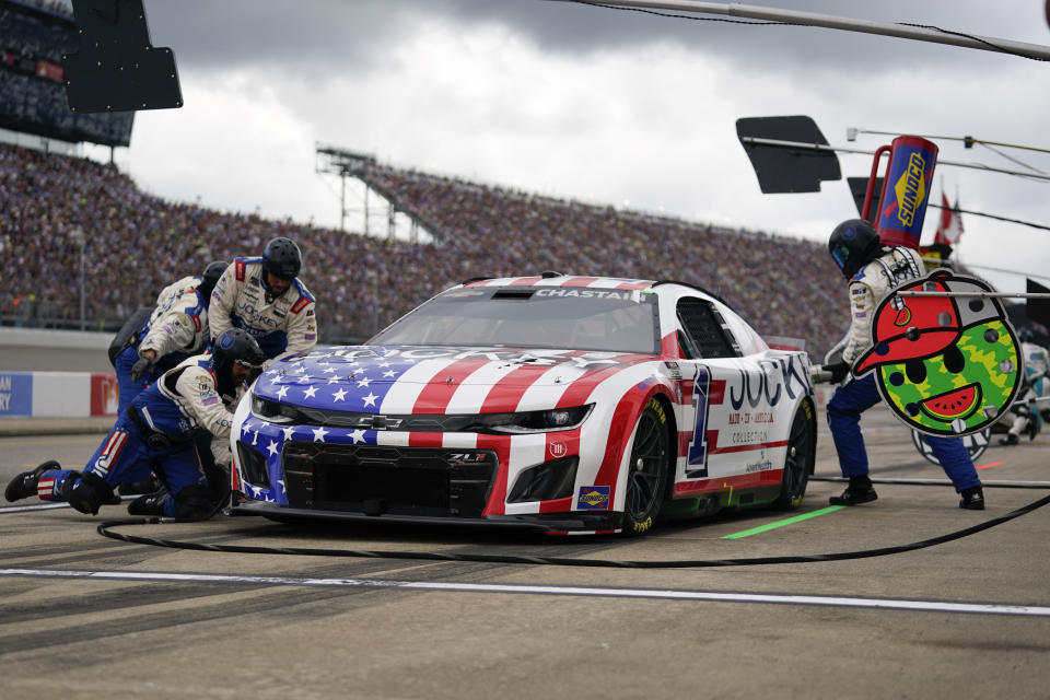 Ross Chastain makes a pit stop during a NASCAR Cup Series auto race at Michigan International Speedway in Brooklyn, Mich., Sunday, Aug. 6, 2023. (AP Photo/Paul Sancya)