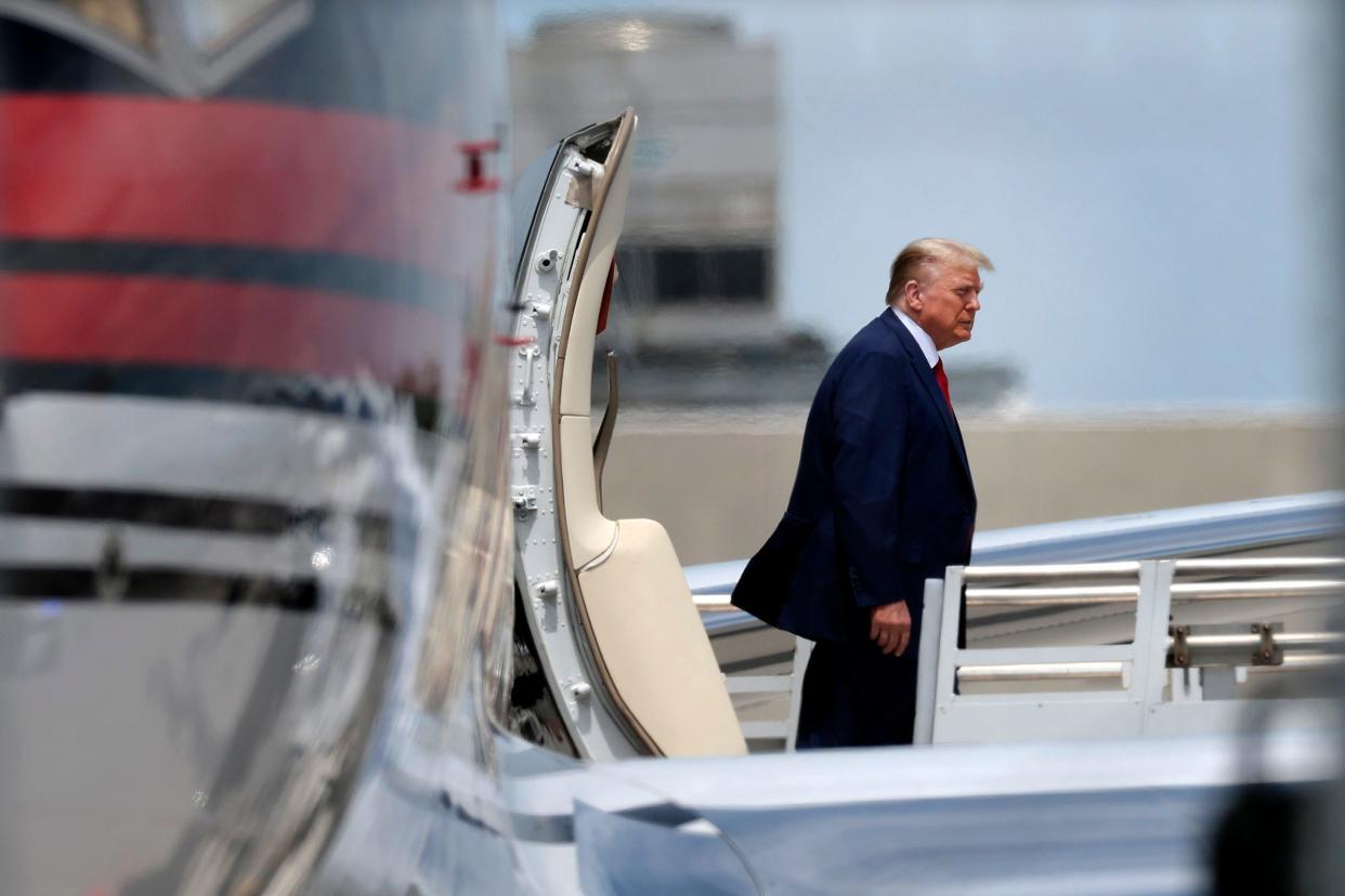 Republican presidential candidate former U.S. President Donald Trump arrives at the Miami International Airport June 12, 2023 in Miami, Florida.