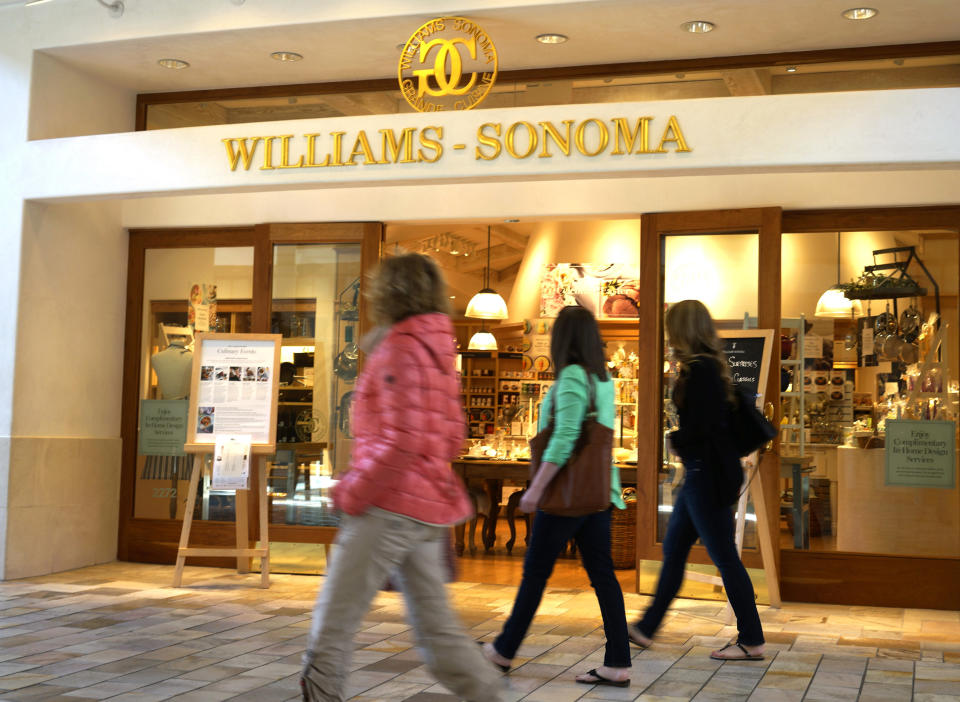 Customers walk by the Williams-Sonoma store in Broomfield, Colorado March 17, 2015. Williams-Sonoma will release their Q4 2014 earnings on March 18. REUTERS/Rick Wilking (UNITED STATES - Tags: BUSINESS)