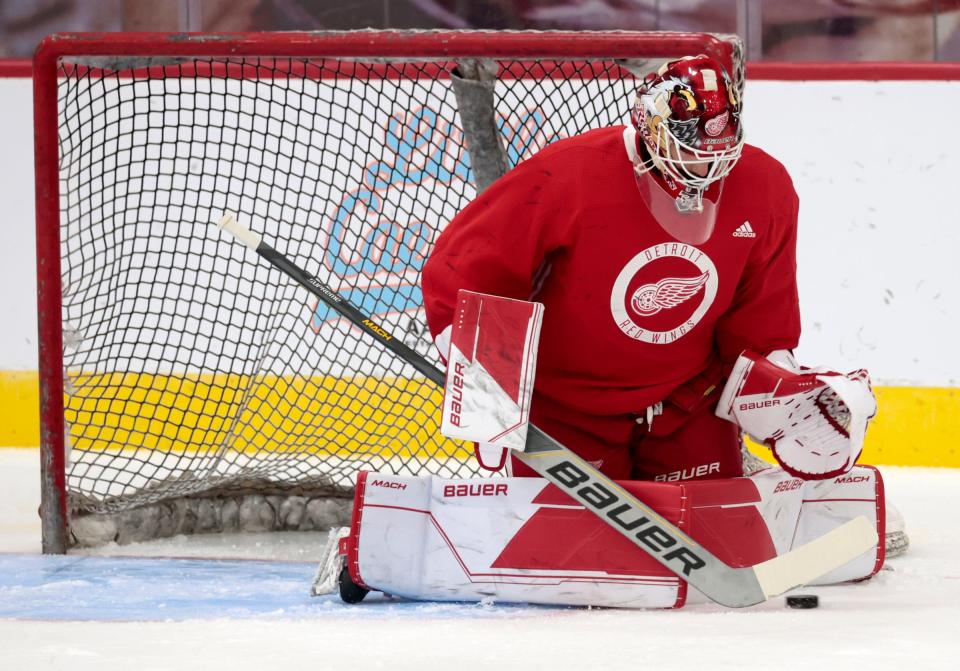 Goalie Sebastian Cossa stops the puck during the Detroit Red Wings development camp with draft picks and free agent invitees at the practice rink at the Little Caesars Arena in Detroit on Tuesday, July 4, 2023.