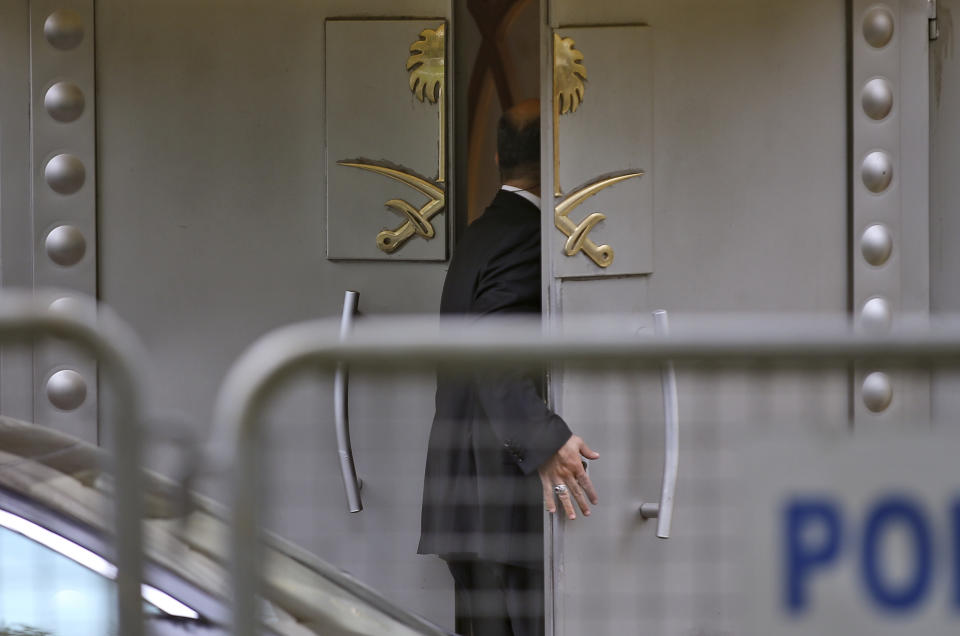 A security guard enters the Saudi Arabia consulate in Istanbul, Thursday, Oct. 4, 2018. Saudi Arabia's Consulate in Istanbul insisted Thursday that Jamal Khashoggi, a missing Saudi contributor to The Washington Post, left its building before disappearing, directly contradicting Turkish officials who say they believe the writer is still inside. (AP Photo/Emrah Gurel)