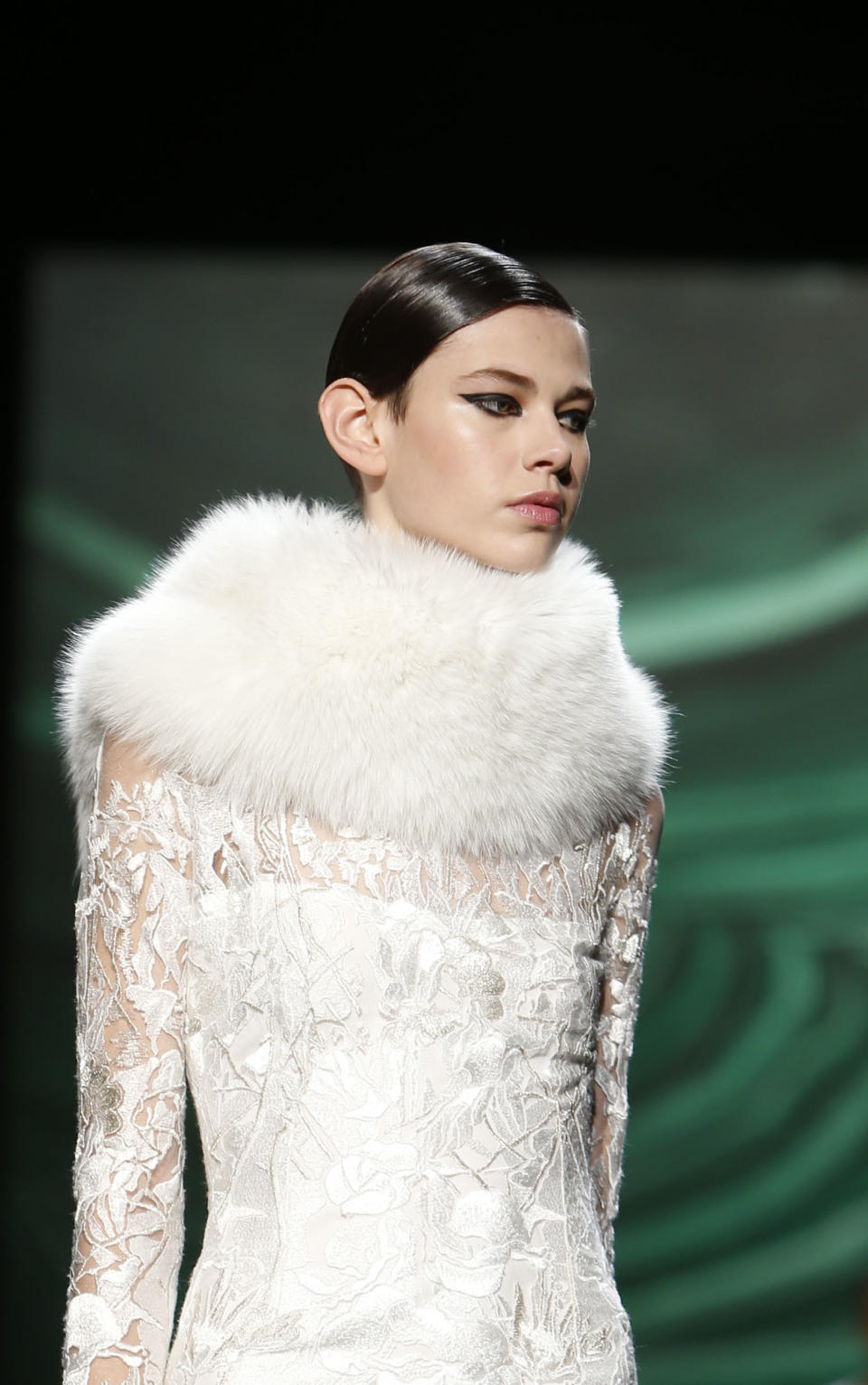 The Monique Lhuillier Fall 2013 collection is modeled during Fashion Week, Saturday, Feb. 9, 2013 in New York. (AP Photo/Jason DeCrow)
