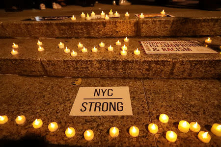 Candles are seen during a vigil for victims of the pickup truck attack at Foley Square in New York City, U.S., November 1, 2017. REUTERS/Jeenah Moon