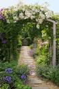 <p>Nestled behind hedges framing a cute wooden door, a cottage garden can be a lush oasis of fragrant blooms climbing over a garden trellises and pretty pathways.</p><p><strong><a href="https://www.countryliving.com/gardening/garden-ideas/g2340/cottage-garden-ideas/" rel="nofollow noopener" target="_blank" data-ylk="slk:Read more cottage garden ideas;elm:context_link;itc:0;sec:content-canvas" class="link ">Read more cottage garden ideas</a>.</strong></p><p><a class="link " href="https://go.redirectingat.com?id=74968X1596630&url=https%3A%2F%2Fwww.wayfair.com%2FOutsunny--Garden-Arch-Trellis-55.1-W-x-23.6-D-Wood-Arbor-845125-L7184-K%7EOTSU1351.html&sref=https%3A%2F%2Fwww.countryliving.com%2Fgardening%2Fgarden-tours%2Fg1432%2Flandscaping-ideas%2F" rel="nofollow noopener" target="_blank" data-ylk="slk:SHOP GARDEN TRELLISES;elm:context_link;itc:0;sec:content-canvas">SHOP GARDEN TRELLISES</a></p>