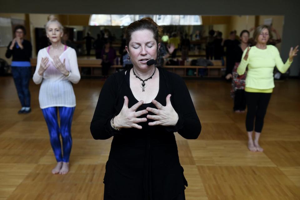 A mindfulness-focused weekly dance class at a recreation center in Littleton, Colo., in 2017. <a href="https://www.gettyimages.com/detail/news-photo/loelle-poneleit-center-leads-her-students-during-a-nia-news-photo/635565412?adppopup=true" rel="nofollow noopener" target="_blank" data-ylk="slk:Seth McConnell/The Denver Post via Getty Images;elm:context_link;itc:0;sec:content-canvas" class="link ">Seth McConnell/The Denver Post via Getty Images</a>