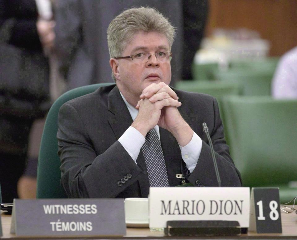 Public sector integrity commissioner Mario Dion is shown in Ottawa on December 13, 2011. Canada's ethics watchdog says he would like to have greater powers to impose penalties against cabinet ministers and public office holders who violate conflict rules, including the ability to levy fines of up to $10,000.