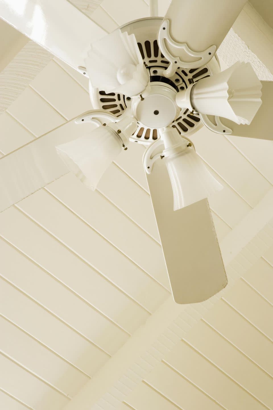 Do dust ceiling fan blades with a pillowcase.