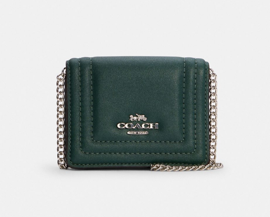 Coach Outlet Mini Wallet On A Chain With Border Quilting in Silver/Metallic Ivy (Photo via Coach Outlet)