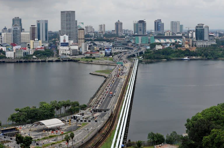 Foreign Minister Datuk Seri Hishammuddin Hussein said the reopening of borders between Malaysia and Singapore is expected to be made known as early as next month. — AFP pic