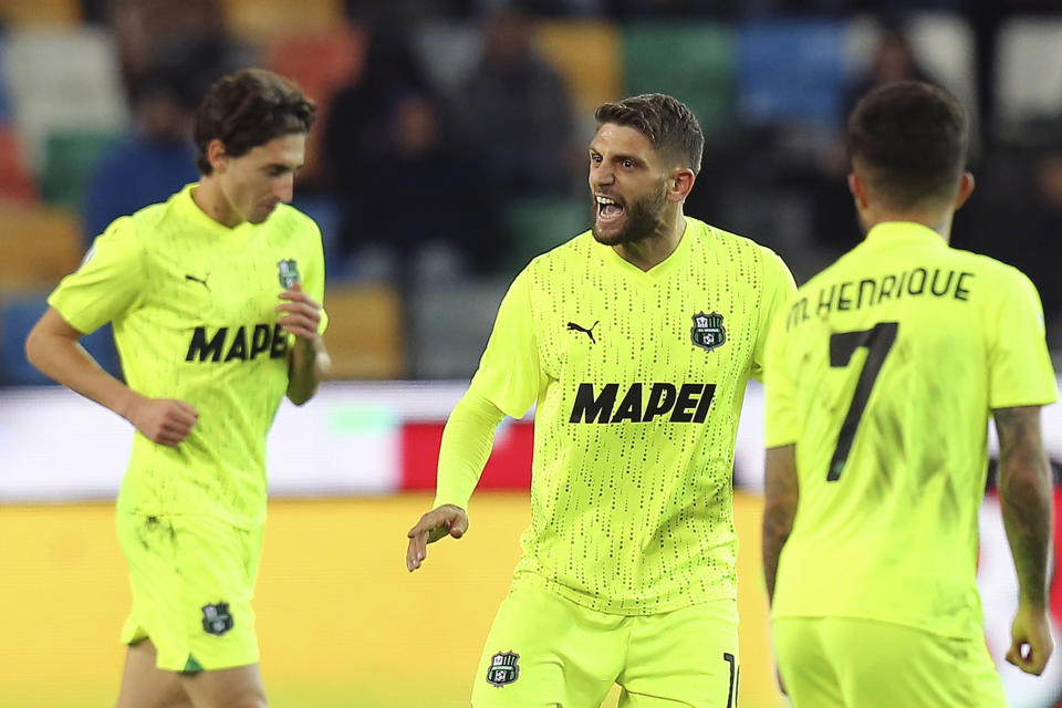 Sassuolo's Domenico Berardi, center, celebrates scoring during the Serie A soccer match between Udinese and Sassuolo at Friuli Stadium, Udine, Italy, Sunday Dec, 17, 2023. (Andrea Rigano/LaPresse via AP)