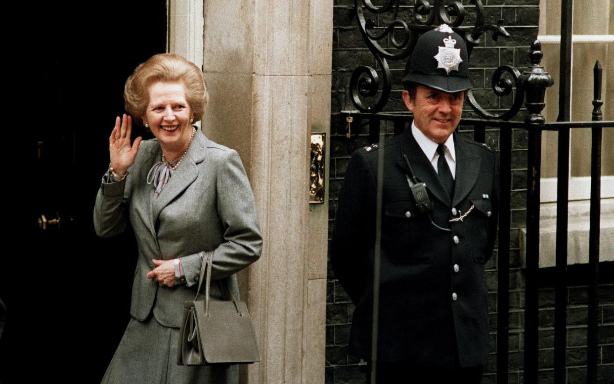 Baroness Thatcher on the steps of 10 Downing Street in 1987 - AP