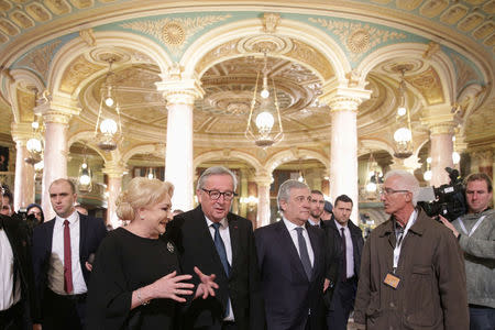 Romanian Prime Minister Viorica Dancila talks to European Commission President Jean-Claude Juncker and European Parliament President Anotnio Tajani as they arrive for the official ceremony marking the start of Romania's EU Council Persidency in Bucharest, Romania, January 10, 2019. Inquam Photos/Octav Ganea via REUTERS