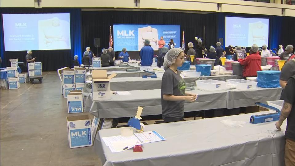 Many families honored Dr. Martin Luther King Jr. by helping others at the Orange County Convention Center.