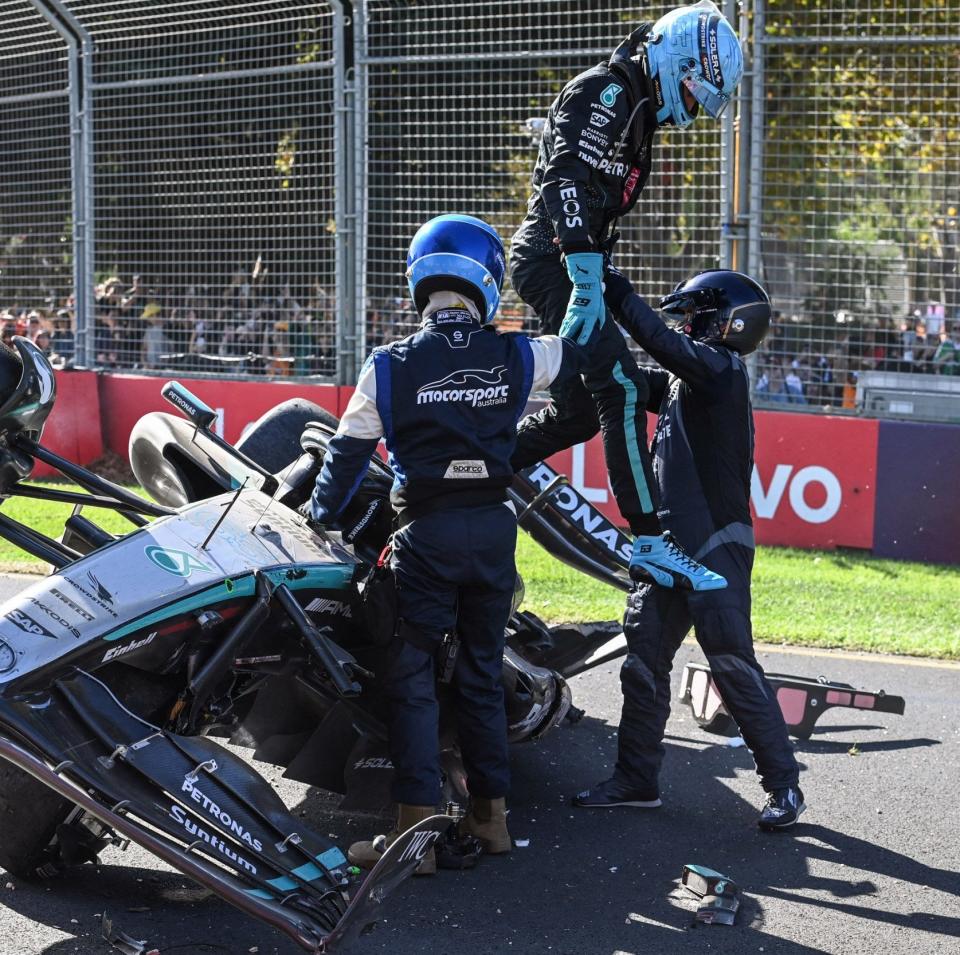 Mercedes' British driver George Russell gets out of his car after crashing during the Australian Formula One Grand Prix at Albert Park Circuit in Melbourne on March 24, 2024