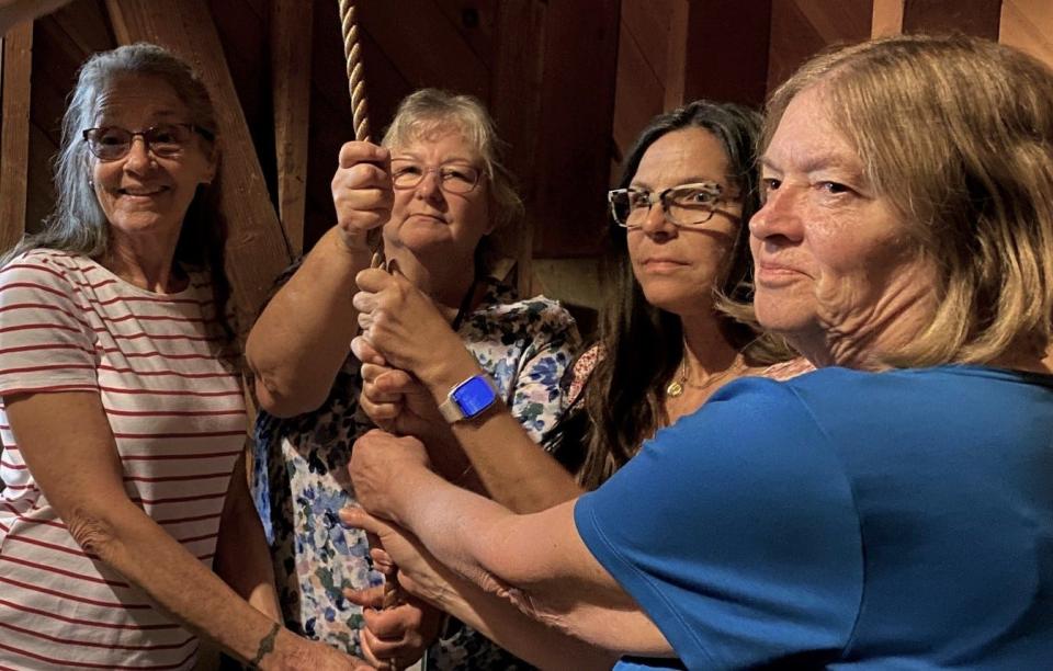 Employees from the York County Registry of Probate took their turn ringing the bell at the historic York County Courthouse in Alfred to mark Sept. 11, 2001.