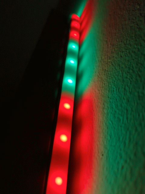 Gift animation of GE CYNC Dynamic Effects Smart Light Strip on wall.