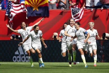 Jul 5, 2015; Vancouver, British Columbia, CAN; United States midfielder Carli Lloyd (10) celebrates with teammates after scoring against Japan during the first half of the final of the FIFA 2015 Women's World Cup at BC Place Stadium. Michael Chow-USA TODAY Sports