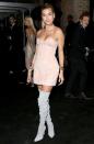 10. Suede thigh-high boots<br> Add a pop of colour to your winter shoe wardrobe with an amazing pair of suede thigh-high boots. If you're all about keeping things fresh and bright during the winter months, pair them with a short baby pink dress like Hailey Baldwin (pictured)