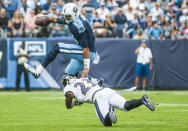 <p>Tennessee Titans quarterback Marcus Mariota (8) avoids a tackle attempt by Baltimore Ravens strong safety Tony Jefferson (23) during an NFL football game on Sunday, Nov. 5, 2017, in Nashville, Tenn. The Titans won 23-20. (Austin Anthony/Daily News via AP) </p>