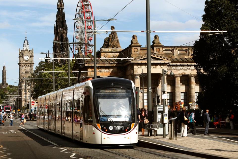 The Edinburgh trams project was delivered three years late and more than double its original budget (PA Archive)