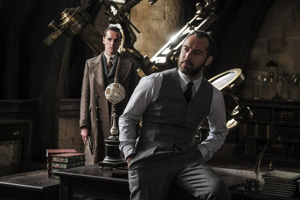 <p>In an effort to thwart Grindelwald’s plans, Albus Dumbledore (Jude Law, right) enlists his former student Newt Scamander, unaware of the dangers that lie ahead. <br> (Photo: Jaap Buitendijk/Warner Bros.) </p>