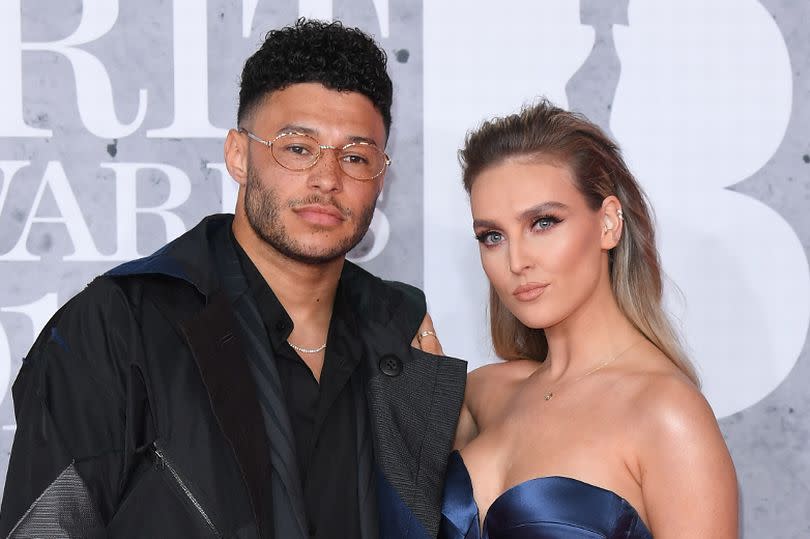 Alex Oxlade-Chamberlain and Perrie Edwards attend The BRIT Awards 2019 held at The O2 Arena on February 20, 2019