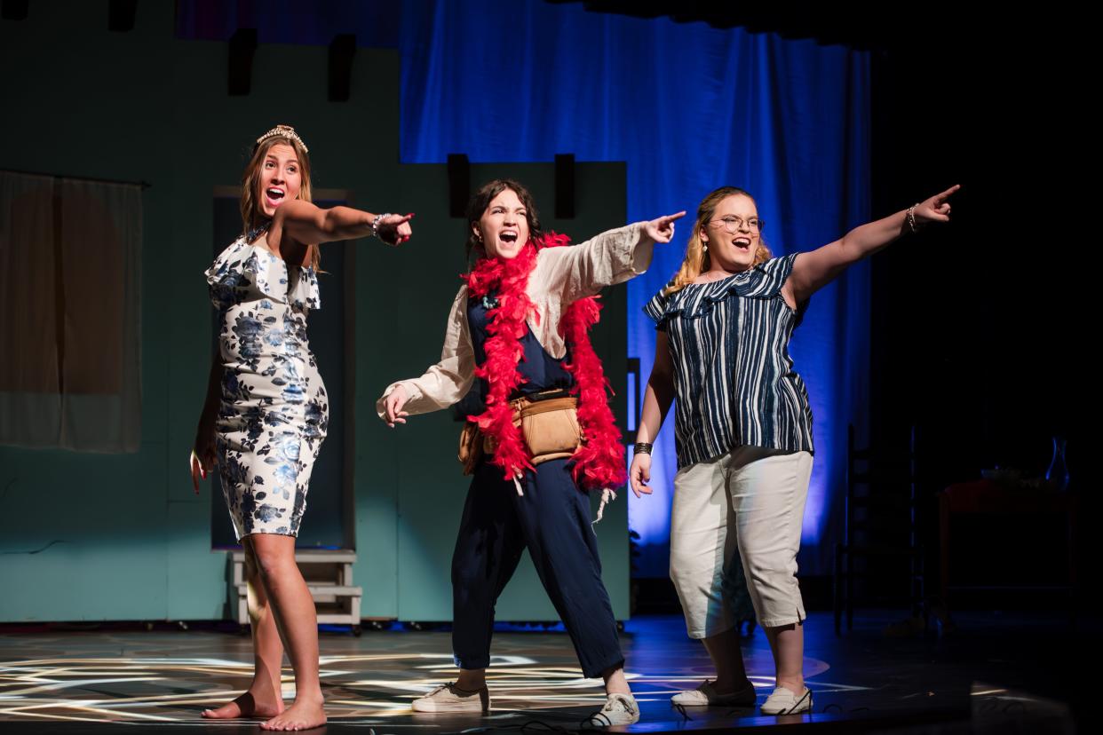 Kayla Fredericks (left to right), Madison McPhee and Darlene Penn perform "Dancing Queen" in Toms River North's production of "Mamma Mia!"