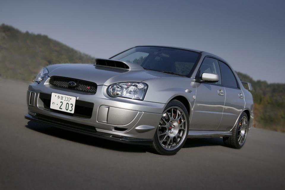 <p>For the S203, Subaru sets the design target as Global Pure Sports Sedan. This ambition is developed and shaped with the help of none other than Norwegian rally ace Petter Solberg. The S203's 2.0-liter EJ20 engine is modified to improve midrange power, so while its 316 horsepower is no greater than the S202's, there is more low-end torque, and peak twist swells to 311 lb-ft at 4400 rpm. Like many previous STI creations, the S203's suspension trades its rubber bushings for ball joints; carbon-shelled Recaro buckets are standard kit. The year 2003 marks the last that "555" logos adorn Subaru's rally cars, though the iconic blue-and-yellow livery lives on. In a tip of its hat to its longtime sponsor, STI limited S203 production to 555 units. </p>