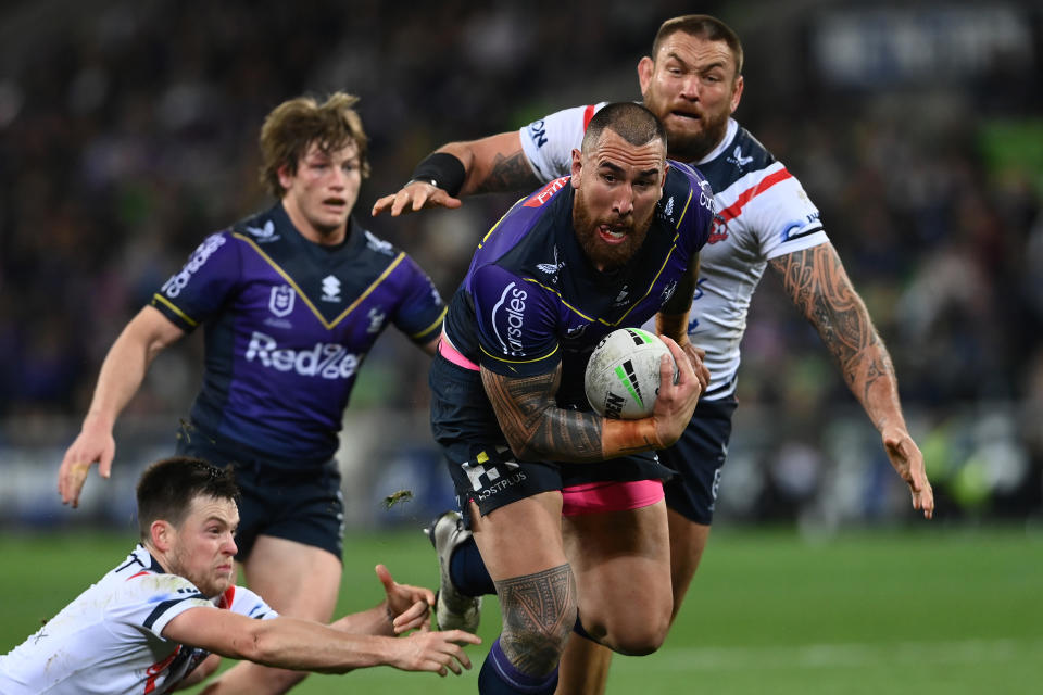 Nelson Asofa-Solomona (pictured) is tackled by Luke Keary.