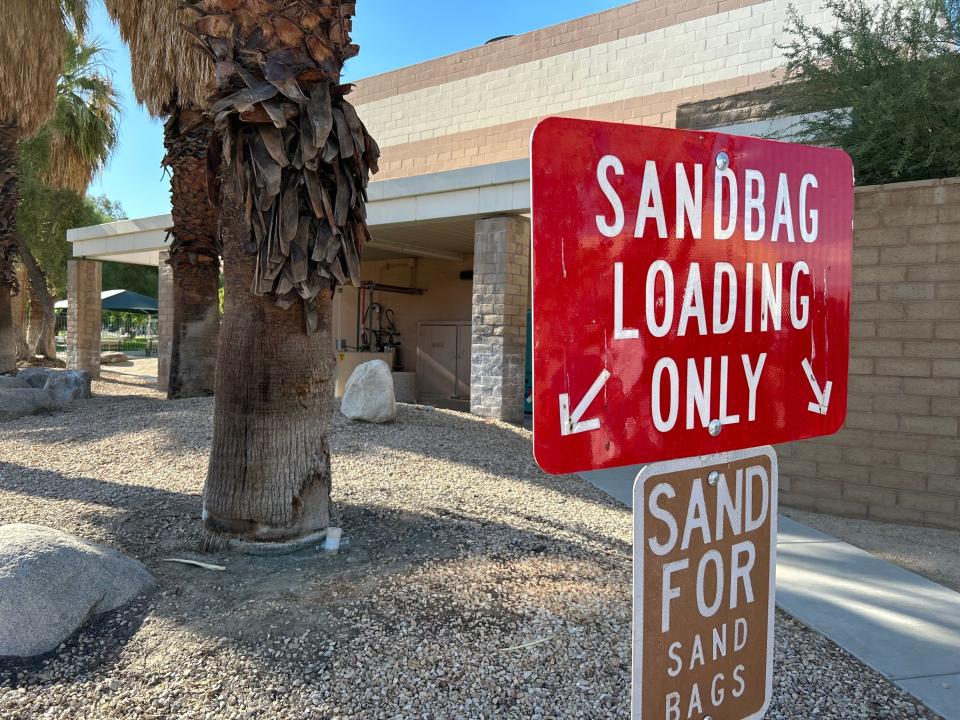 A new sandbag loading only sign stands in front of Palm Springs City Hall ahead of Hurricane Hilary on Friday, Aug. 18 in Palm Springs, Calif.