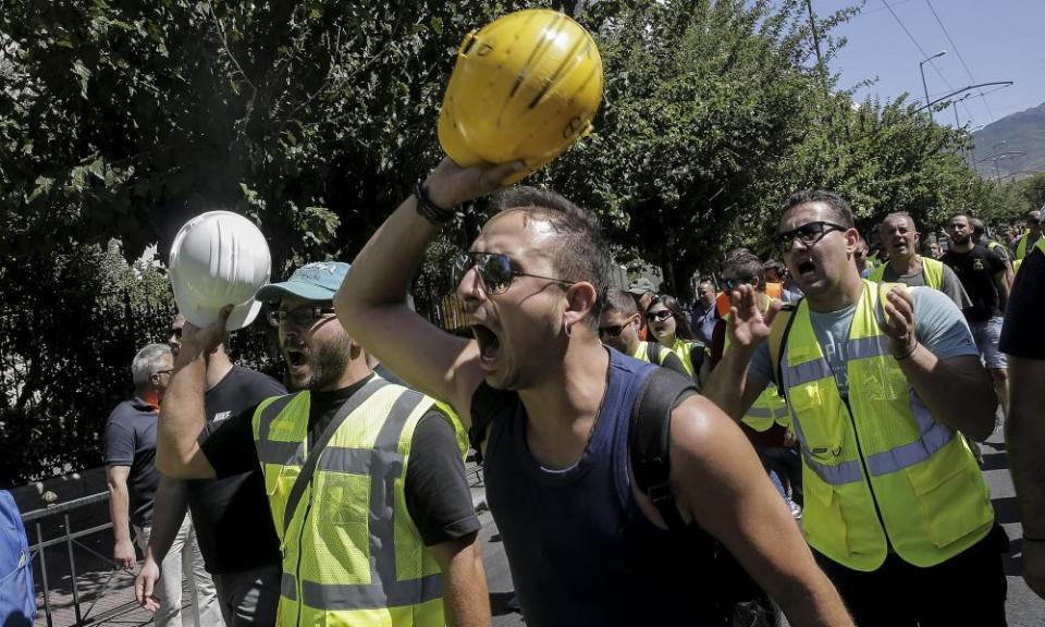 Miners outside the environment ministry in Athens.