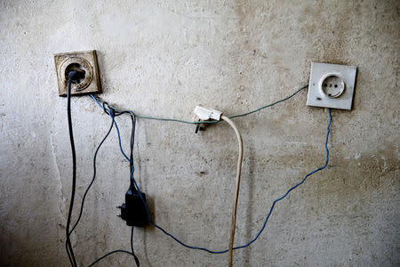 Electrical socket is seen in a room of Bosnian Serb Rasko Kovacevic, an internally displaced person from Gracanica, in Kladari Donji near Modrica, October 1, 2018. REUTERS/Dado Ruvic