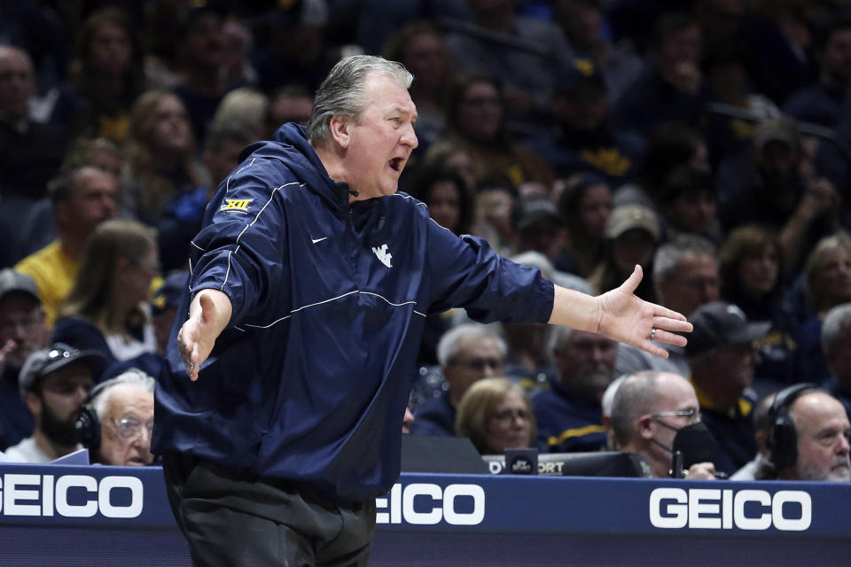 West Virginia coach Bob Huggins reacts during the first half of an NCAA college basketball game against Texas Tech on Saturday, Feb. 18, 2023, in Morgantown, W.Va. (AP Photo/Kathleen Batten)