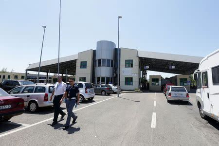 The European Border and Coast Guard Agency known as FRONTEX police patrol the area near Albania-Montenegro Crosspoint in Shkodra, Albania June 6, 2018. Picture taken June 6, 2018. REUTERS/Florion Goga