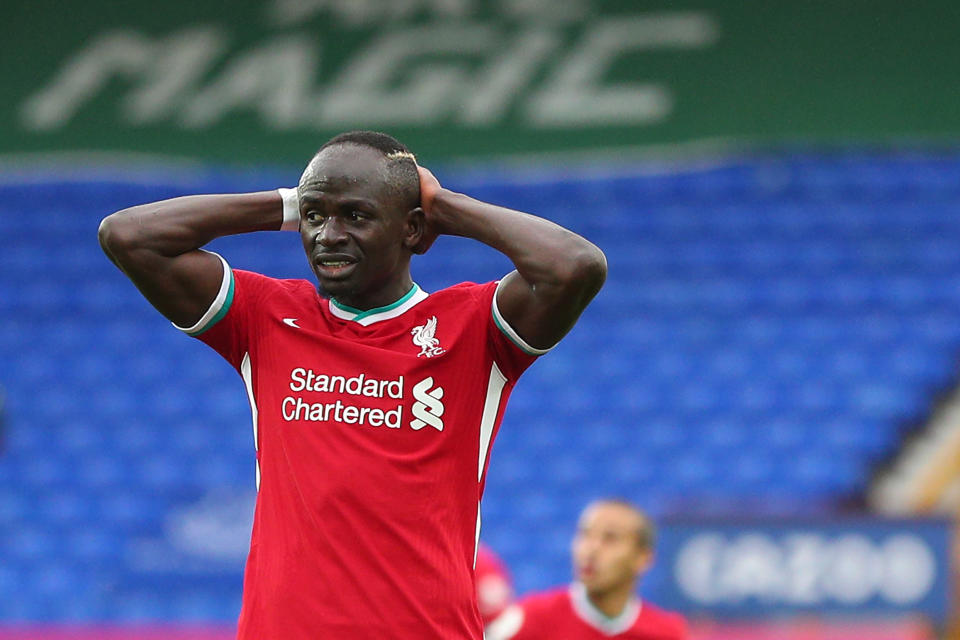 Liverpool's Senegalese striker Sadio Mane reacts during the English Premier League football match between Everton and Liverpool at Goodison Park in Liverpool, north west England on October 17, 2020. (Photo by Peter Byrne / POOL / AFP) / RESTRICTED TO EDITORIAL USE. No use with unauthorized audio, video, data, fixture lists, club/league logos or 'live' services. Online in-match use limited to 120 images. An additional 40 images may be used in extra time. No video emulation. Social media in-match use limited to 120 images. An additional 40 images may be used in extra time. No use in betting publications, games or single club/league/player publications. / (Photo by PETER BYRNE/POOL/AFP via Getty Images)