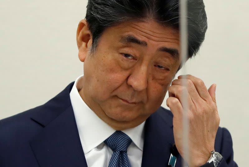 Former Japanese PM Shinzo Abe holds a news conference in Tokyo