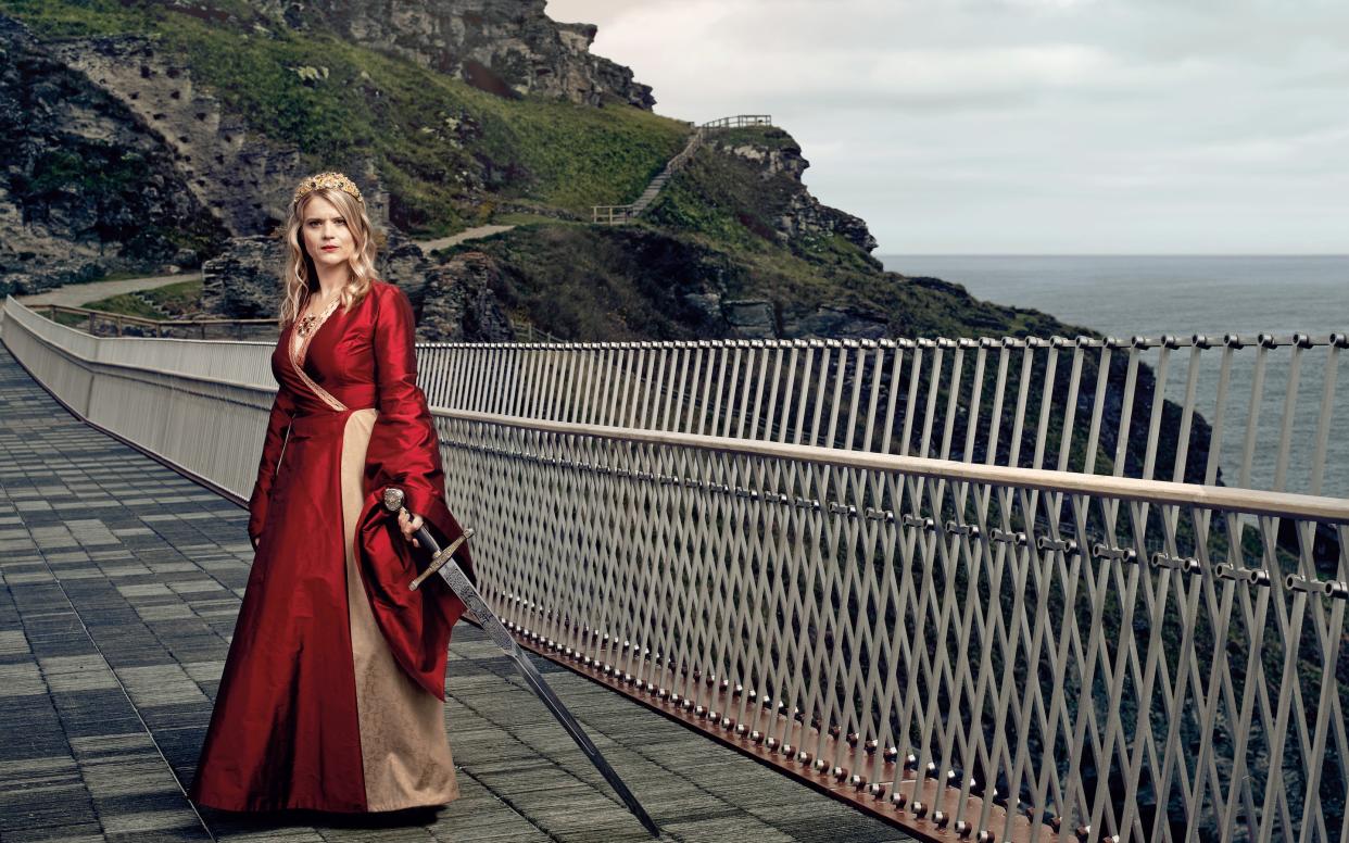 Gavanndra Hodge on the bridge at Tintagel Castle - Harry Lawlor