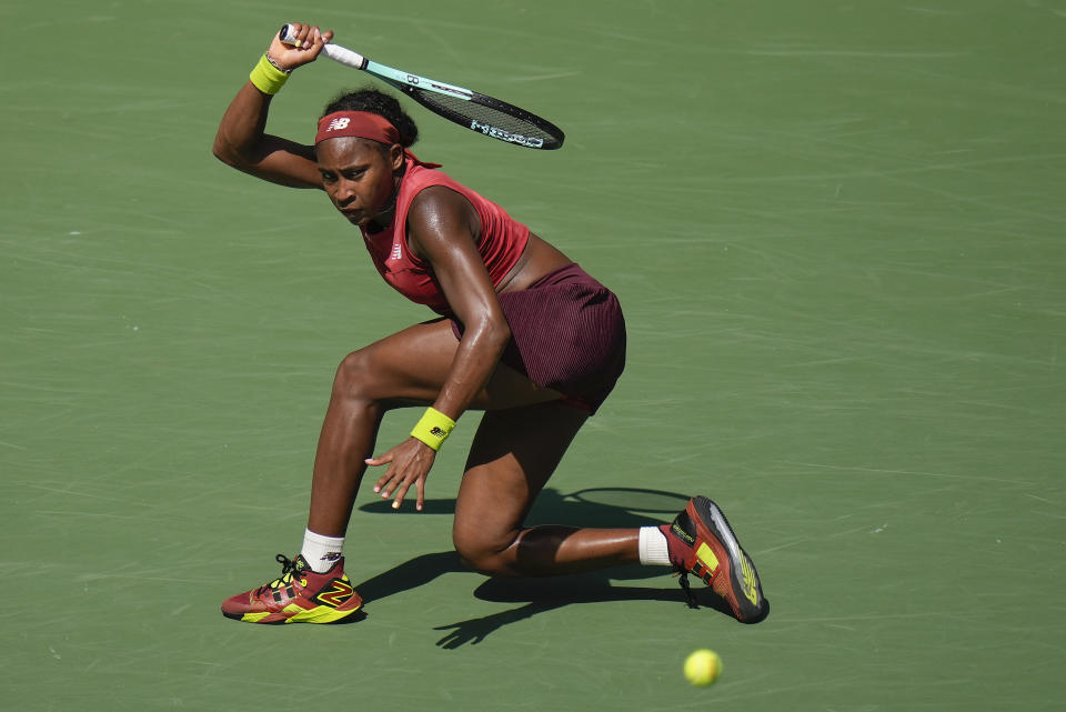 Coco Gauff, of the United States, returns a shot to Jelena Ostapenko, of Latvia, during the quarterfinals of the U.S. Open tennis championships, Tuesday, Sept. 5, 2023, in New York. (AP Photo/Seth Wenig)