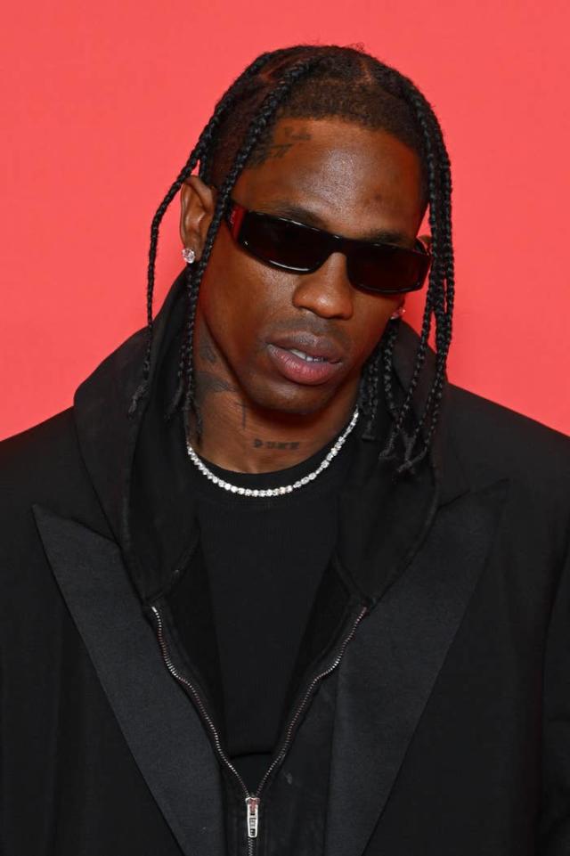 Travis Scott Wears His Sunglasses at Night