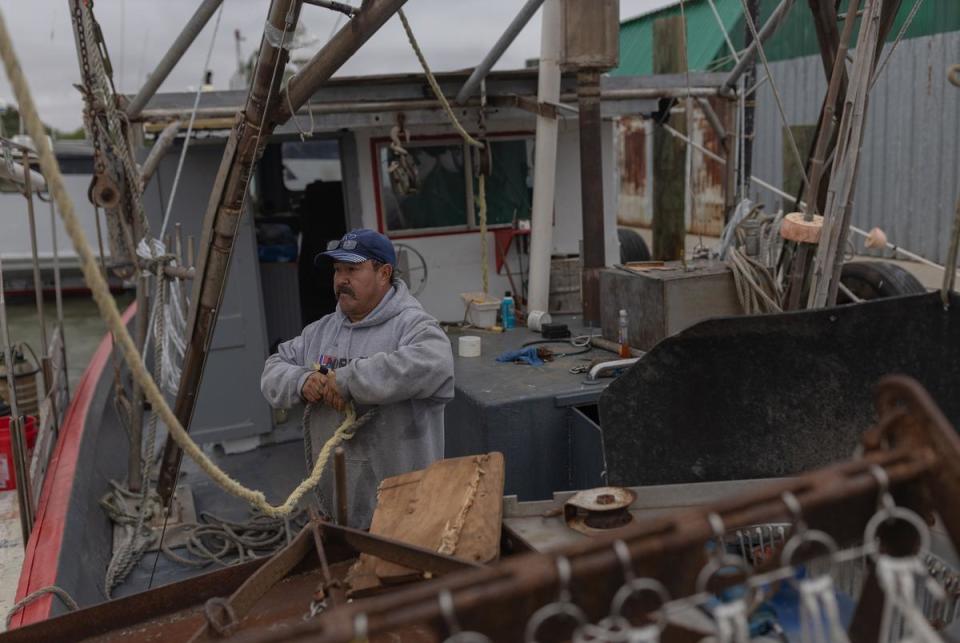 Juan Gutierrez, captain and owner of his boat, prepared his boat for the upcoming oyster harvesting season at a Texas City fishing dock on Oct. 30, 2023.