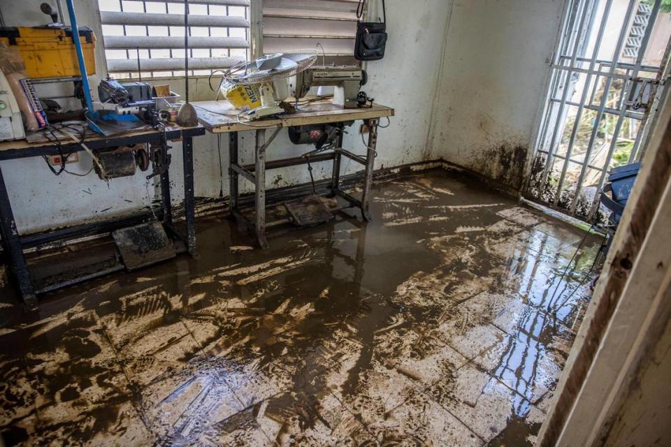 Sewing machines at Antonio Perez Miranda’s home were damaged when it was flooded with mud from the river Rio de la Plata in the San Jose de Toa Baja neighborhood.