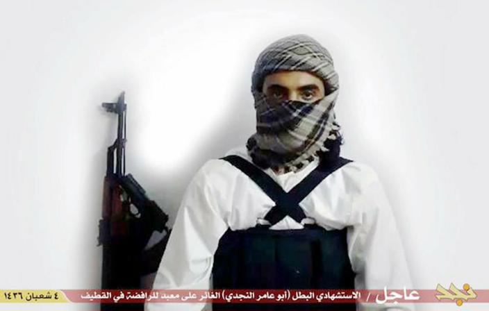 FILE - This image from a militant website associated with Islamic State group extremists, posted May 23, 2015, purports to show a suicide bomber identified as a Saudi citizen with the nom de guerre Abu Amer al-Najdi who carried out an attack on a Shiite mosque. A new study published Tuesday, Feb. 5, 2019, by the King Faisal Center for Research and Islamic Studies is challenging the notion that jihadist fighters are necessarily disenfranchised and lacking opportunity, finding instead that most millennial Saudi jihadists were relatively well-educated, not driven purely by religious ideology and showed little interest in suicide bombings. (Militant photo via AP, File)