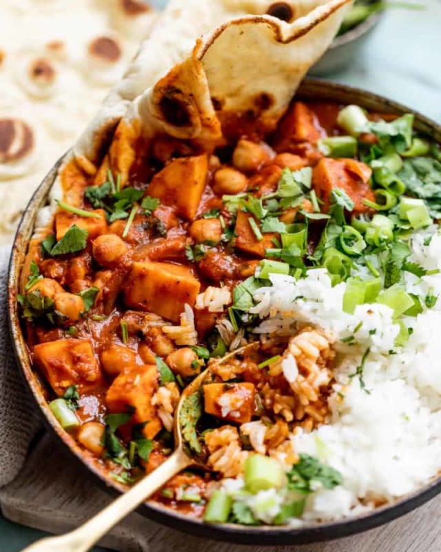 <p>Britney Breaks Bread</p><p>Sweet Potato Chickpea Curry is a rich coconut curry broth enhanced with vibrant spices and veggies for a nutritious, protein-packed meal.</p><p><strong>Get the recipe: <a href="https://britneybreaksbread.com/sweet-potato-chickpea-curry/" rel="nofollow noopener" target="_blank" data-ylk="slk:Sweet Potato Chickpea Curry;elm:context_link;itc:0;sec:content-canvas" class="link rapid-noclick-resp">Sweet Potato Chickpea Curry</a></strong></p>