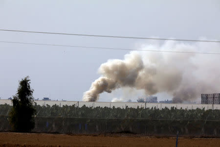 Smoke rises near the area where the Israeli forces said a "significant" cross-border attack tunnel from the Gaza Strip, which was being dug by the enclave's dominant Islamist group, Hamas, was destroyed, near Israel's border with the Gaza Strip December 10, 2017. REUTERS/Amir Cohen