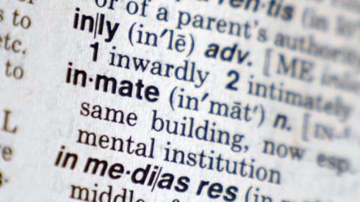 The word “inmate” appears in Webster’s New World Dictionary in New York. The state has amended a series of laws to remove the word “inmate” and replace it with “incarcerated person” to refer to people serving prison time. (Photo: Mary Altaffer/AP)