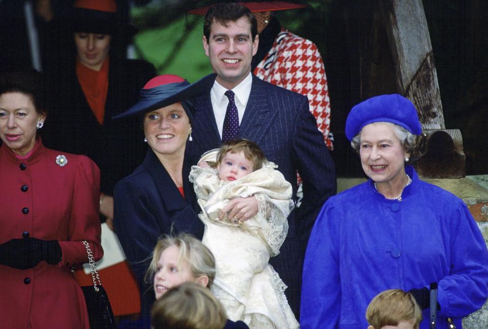 Princess Margaret, the Duchess Of York, Prince Andrew, and the Queen attend the christening of Princess Eugenie, center.