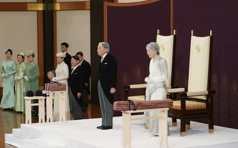 Japan's Emperor Akihito and Empress Michiko attend a ritual called Taiirei-Seiden-no-gi - Credit: Japan Pool/Pool via REUTERS